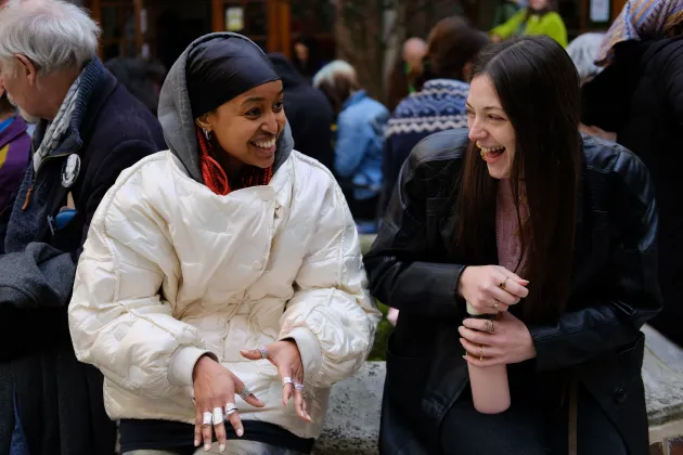 Two people laughing