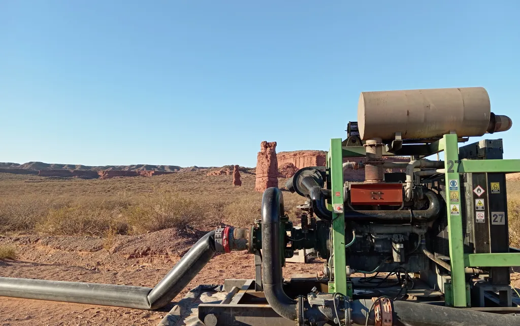 A photo of a machine against a desert landscape